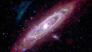 A composite image of the Andromeda galaxy in different wavelengths of light. 