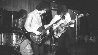 Jack Bruce (left), Ginger Baker, and Eric Clapton perform live at the Cafe Au Go Go in New York City in October 1967