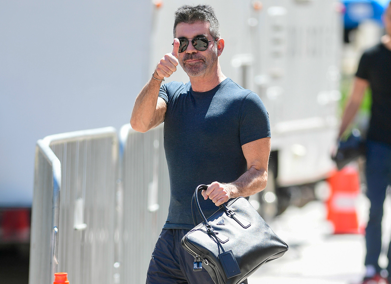 Photo of Simon Cowell allegedly in a back brace.