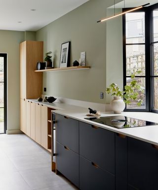 A small kitchen with staggered countertop depths to make more space