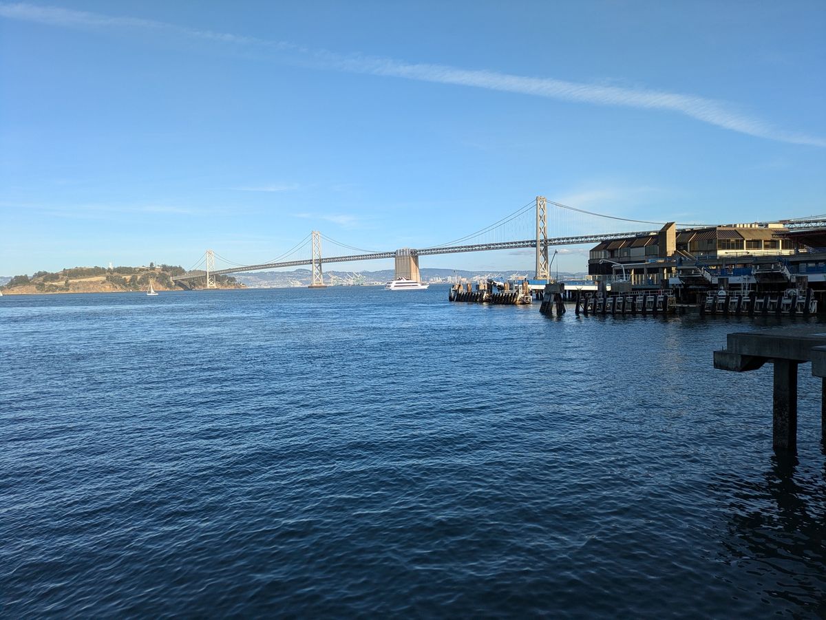 Photo of the Bay Bridge shot from the shore by a Pixel 8a