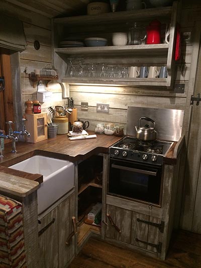 The cute kitchen is small but perfectly formed