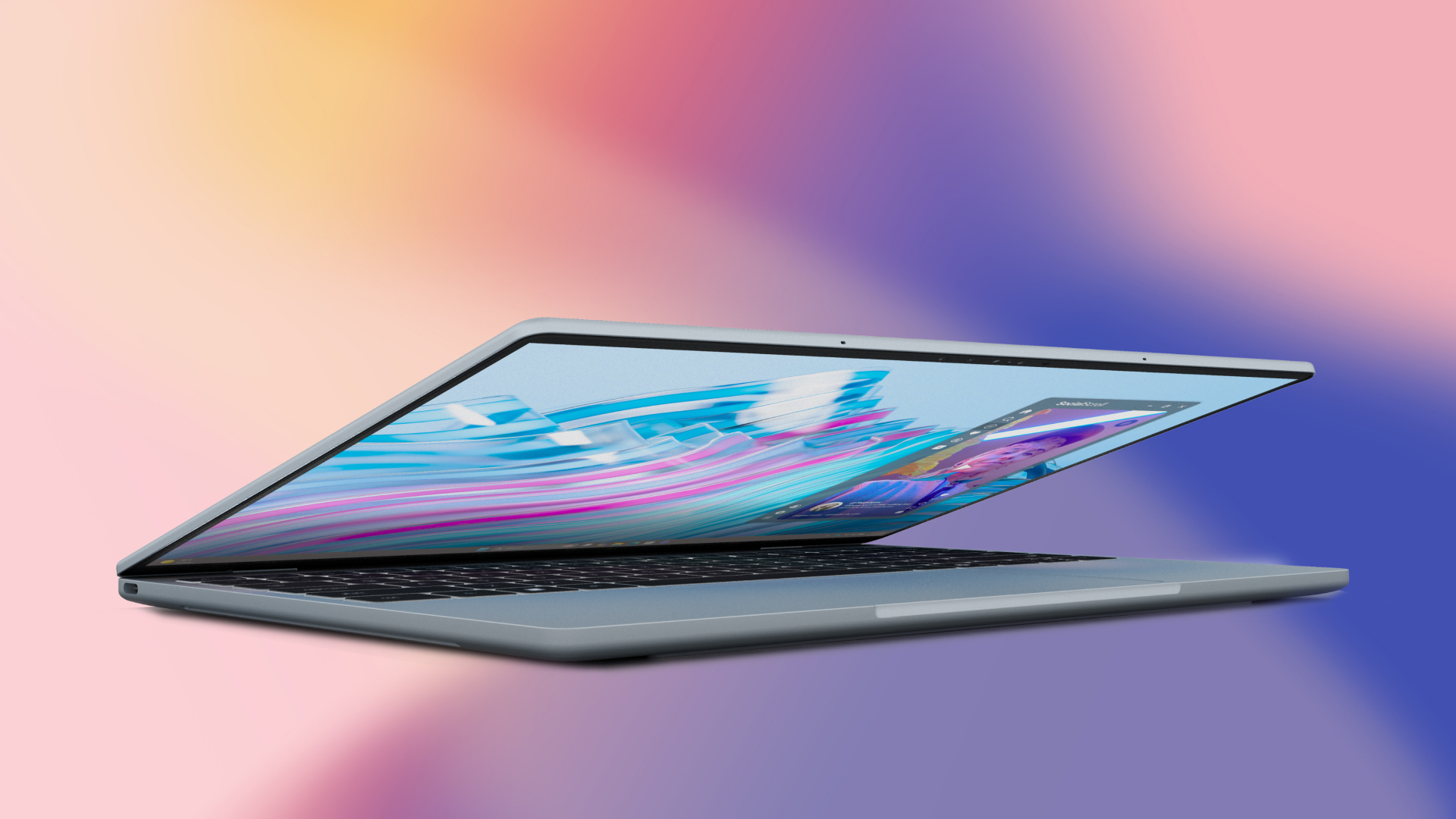 Dell XPS 13 shown with the lid nearly closed, you can just see the screen