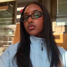 A woman with straight, flat-ironed hair.