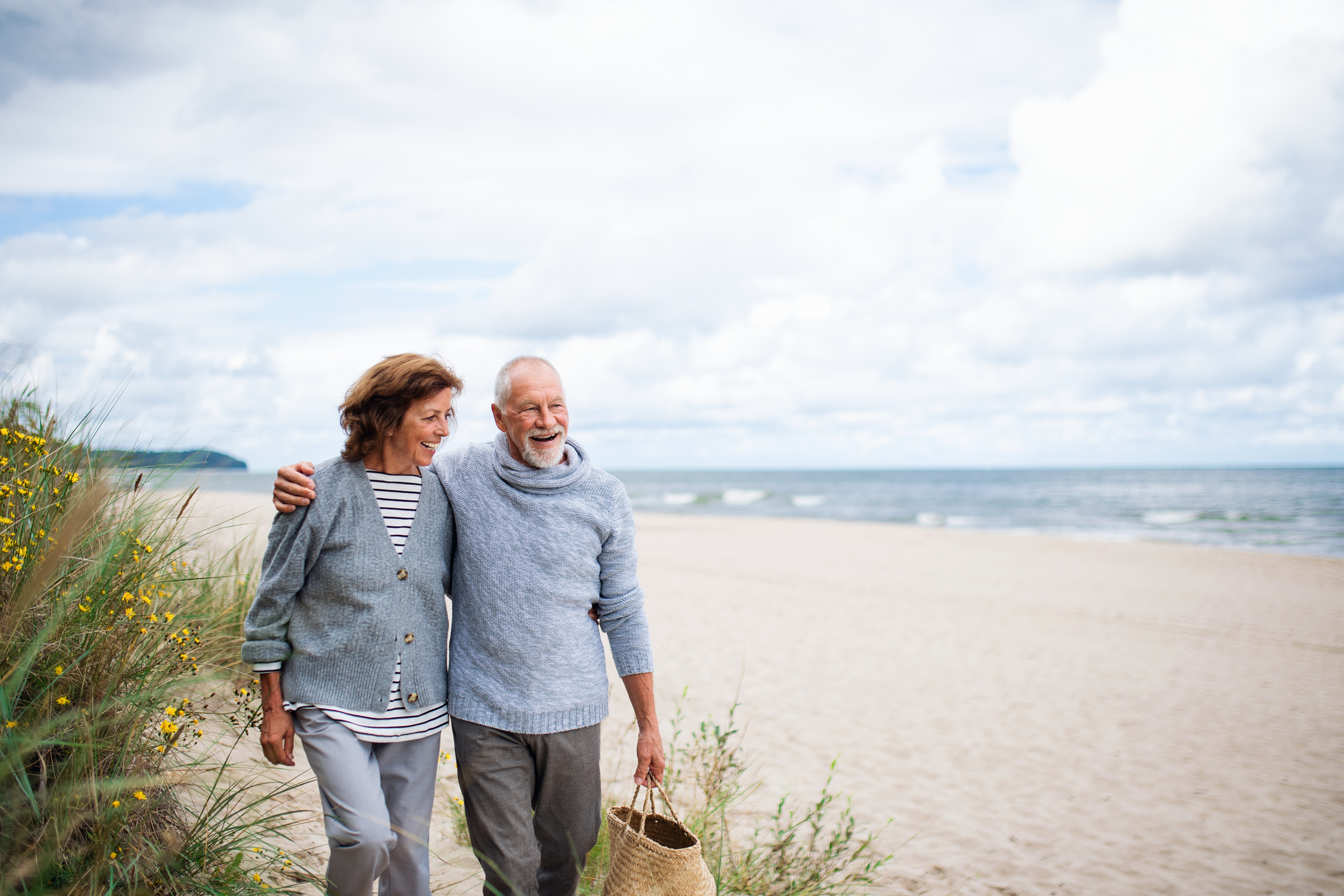Couple walking on the beach 