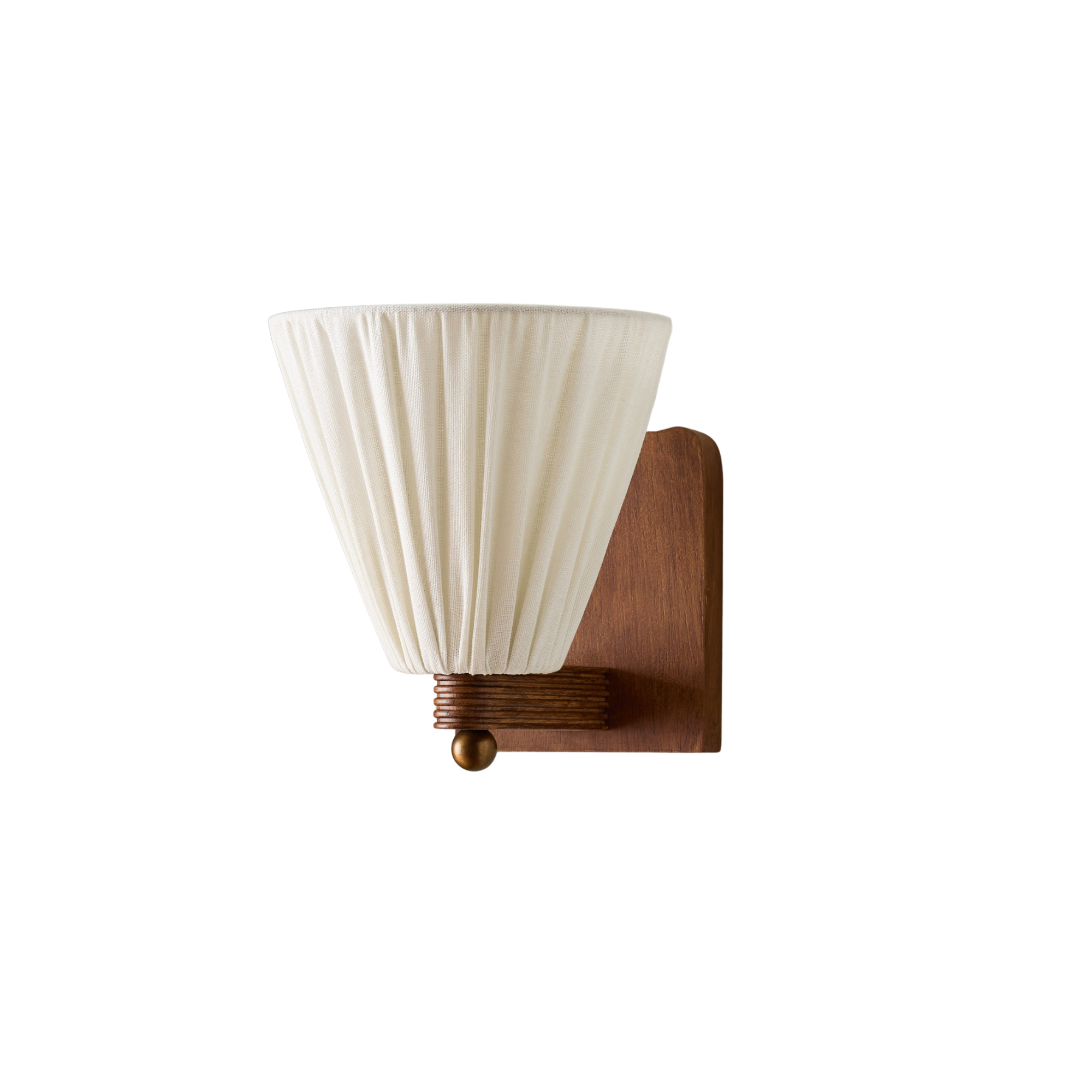 a wall sconce with a white fabric shade