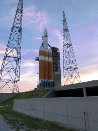 A view of the Delta IV Heavy from the other side, showing the Parker Solar Probe logo.