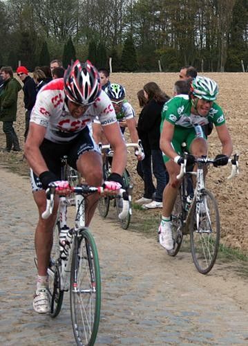 Kurt-Asle Arvesen (CSC) digs in, but his captain Fabian Cancellara is way up the road.