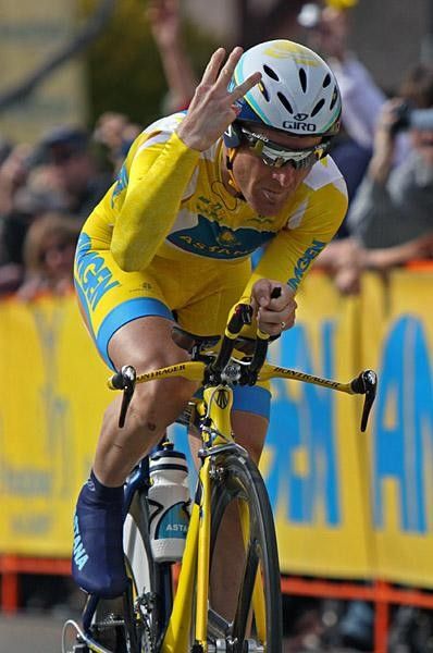 With the finish line reflected in his glasses, Levi Leiphiemer signals three wins