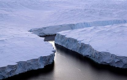 Iceberg breaking off of Antarctica.