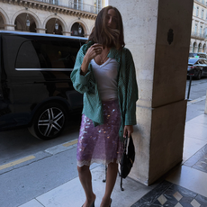 An image of a woman wearing best statement fall skirt 2026