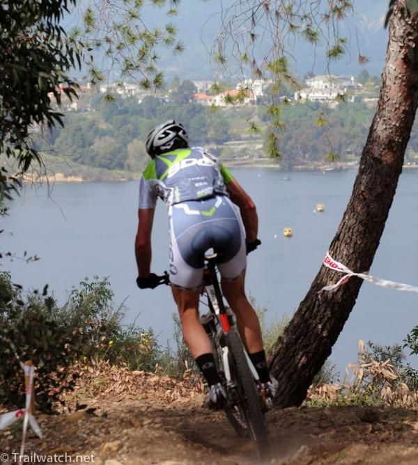 A rider on the ridge overlooking the lake