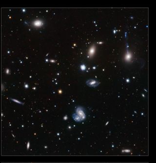 colliding galaxies hercules cluster closeup