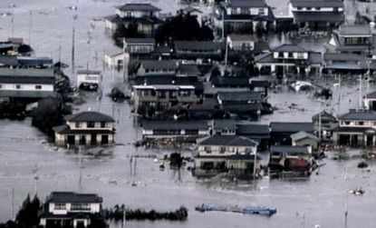 Parts of northeastern Japan are submerged after a catastrophic 8.9-magnitude earthquake, and subsequent tsunami.
