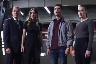 two men and two women look shocked in a space ship like room in the marvel show agents of shield