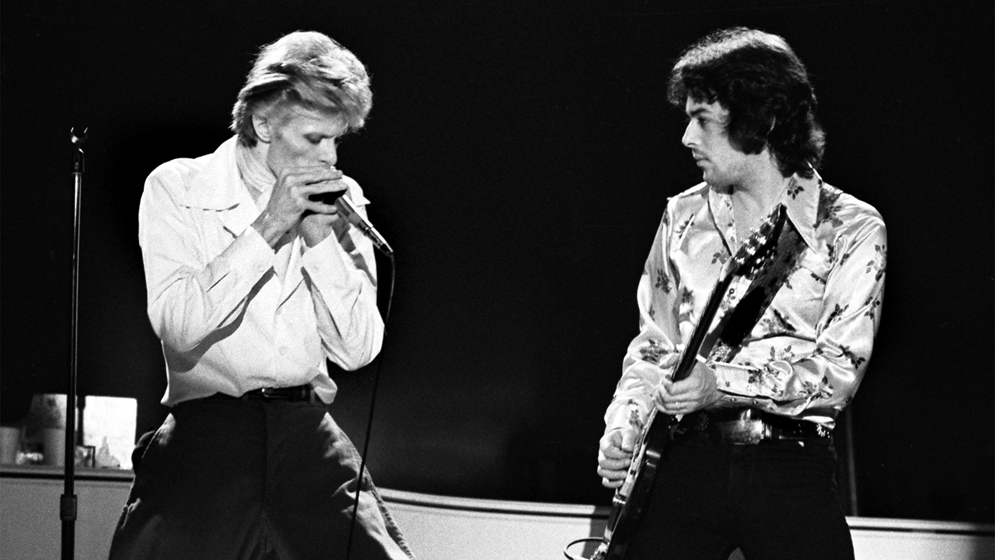 David Bowie and Earl Slick performing on David Bowies&#039; Diamond Dogs Tour at the Boston Music Hall on November 15, 1974