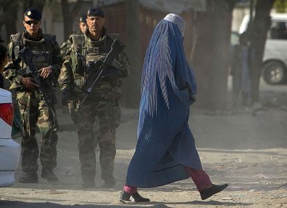 French NATO soldiers patrol the streets of Kabul in 2008.