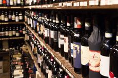 Bottles of wine on shop shelves
