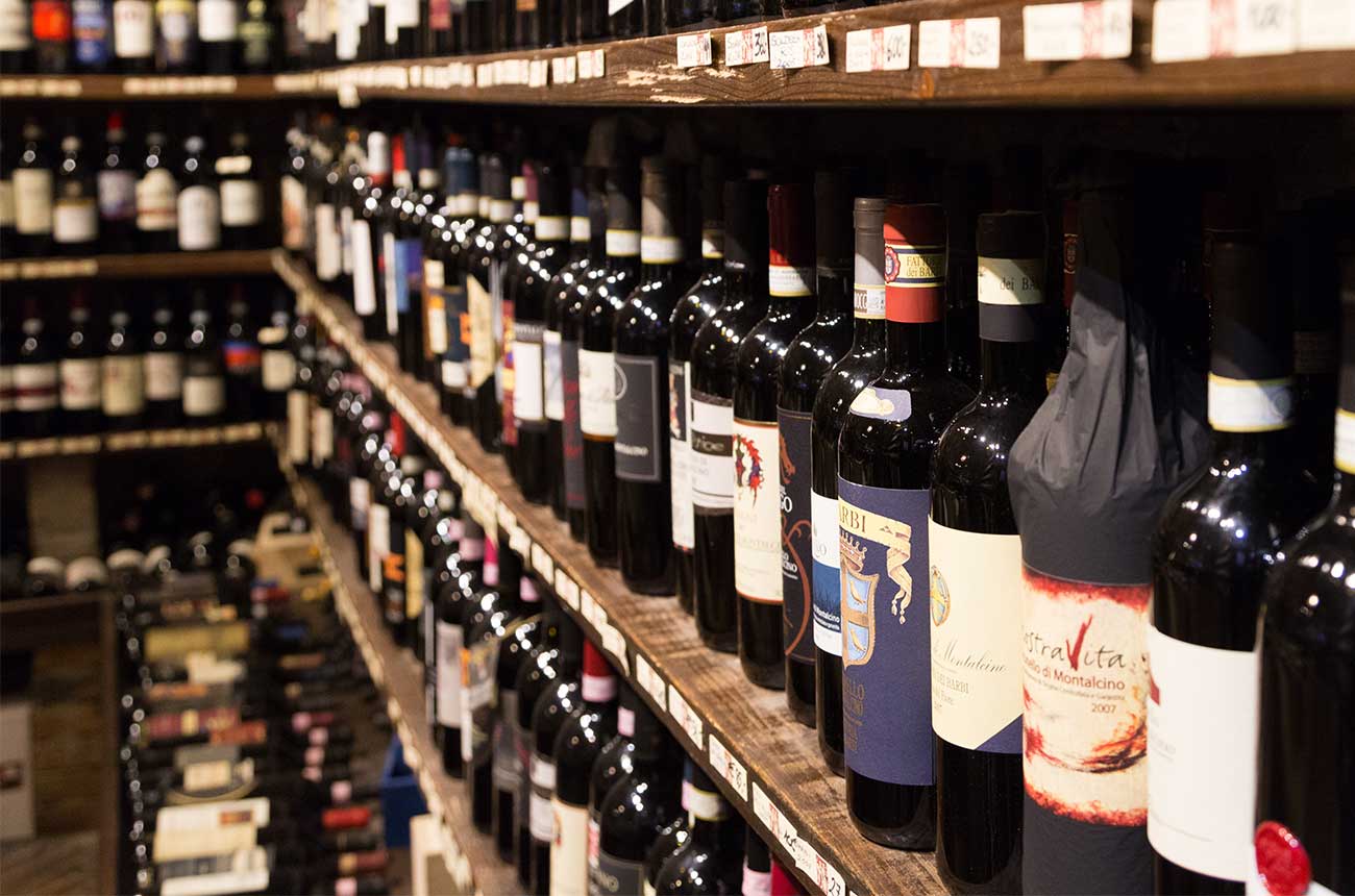 Bottles of wine on shop shelves