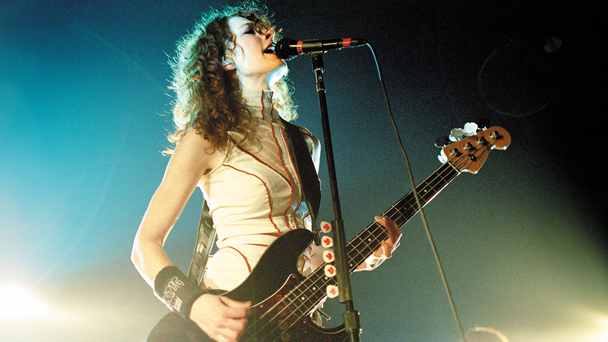 Melissa Auf der Maur playing bass on stage 