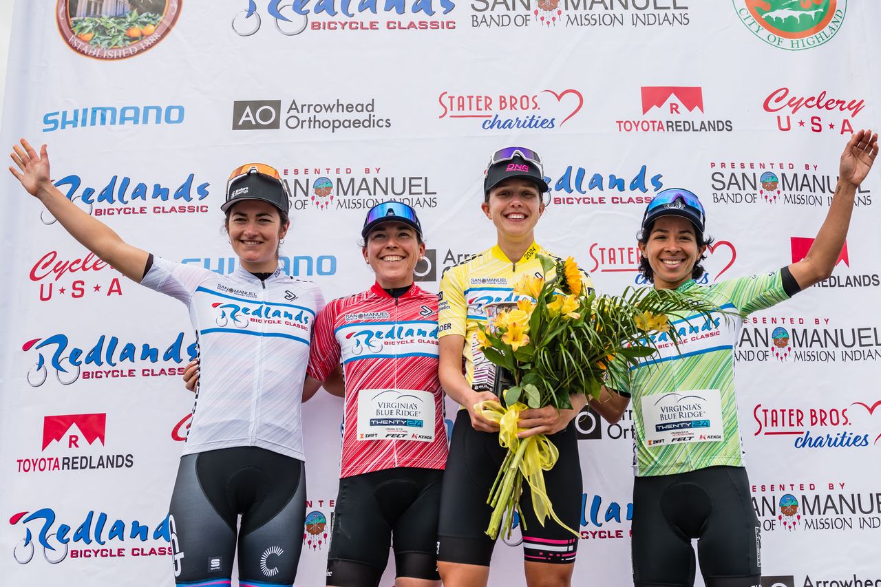 Women's overall GC podium at 2024 Redlands Bicycle Classic: Emma Langley (Virginia's Blue Ridge Twenty24) in red QOM jersey, Marlies Mejias in the sprint leaders jersey (Virginia's Blue Ridge Twenty24), Nadia Gontova in yellow (DNA Pro Cycling), and Best Amateur Cecile Lejeune (CCB p/b LLG) in white. Photo: Above Four Media