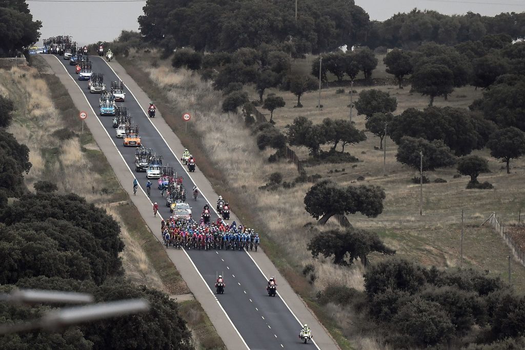 The pack rides through Vecinos during the 16th stage of the 2020 La Vuelta cycling tour of Spain a 162km race from Salamanca to Ciudad Rodrigo on November 6 2020 Photo by OSCAR DEL POZO AFP Photo by OSCAR DEL POZOAFP via Getty Images