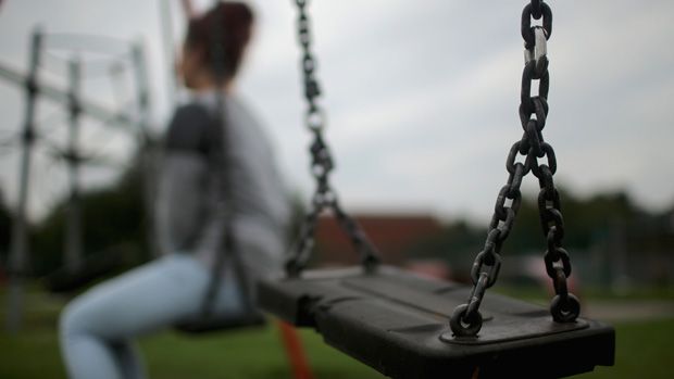 ROTHERHAM, ENGLAND - SEPTEMBER 03:(EDITORS NOTE: This image was processed using digital filters.) A teenage girl, who claims to be a victim of sexual abuse and alleged grooming, poses in Roth