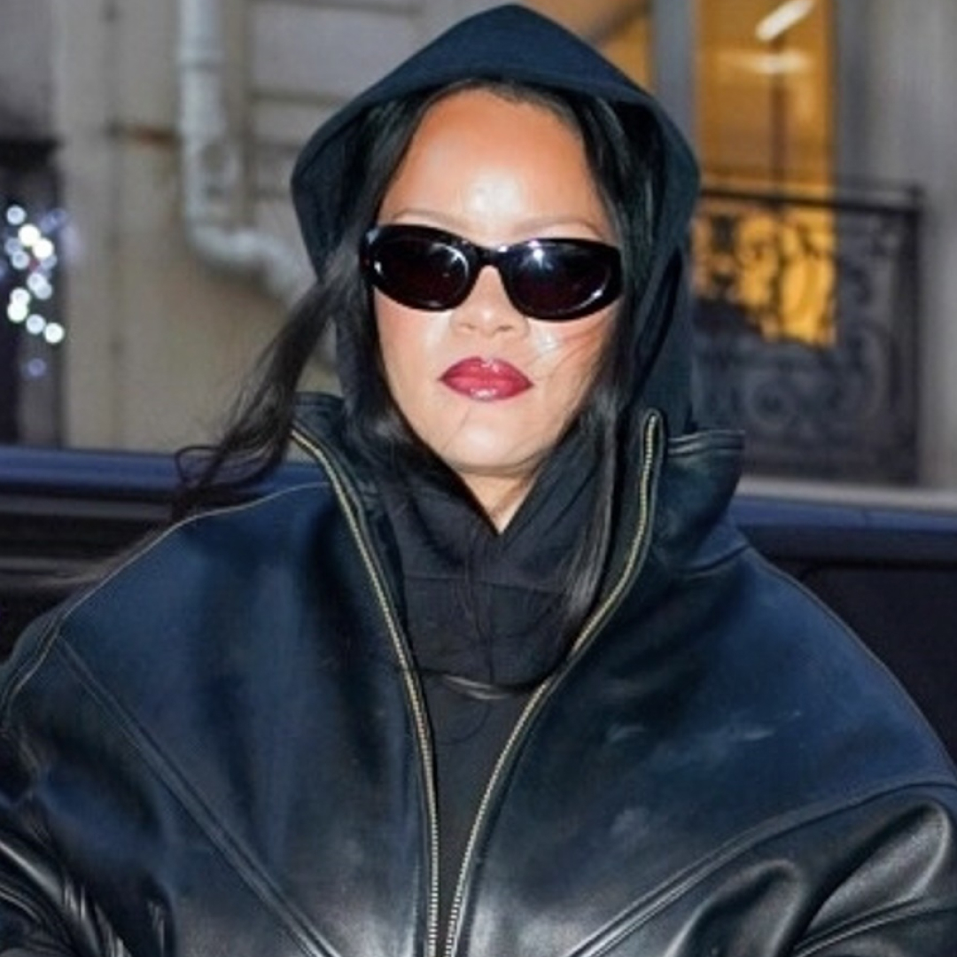 Rihanna was spotted in Paris wearing a leggings outfit with the high-vamp flats trend