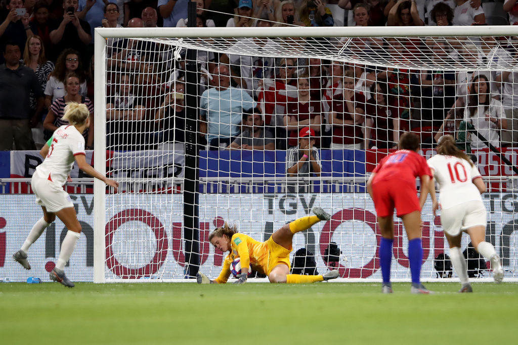 Alyssa Naeher of the USA saves a penalty from Steph Houghton of England during the 2019 FIFA Women's World Cup France Semi Final match between England and USA at Stade de Lyon on July 02, 2019 in Lyon, France.