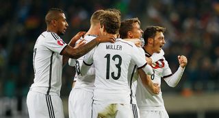 Max Kruse (2.R) of Germany celebrates with team mates after scoring his team's second goal during the UEFA EURO 2016 Group D qualifying match between Germany and Georgia at Stadium Leipzig on October 11, 2015 in Leipzig, Germany.