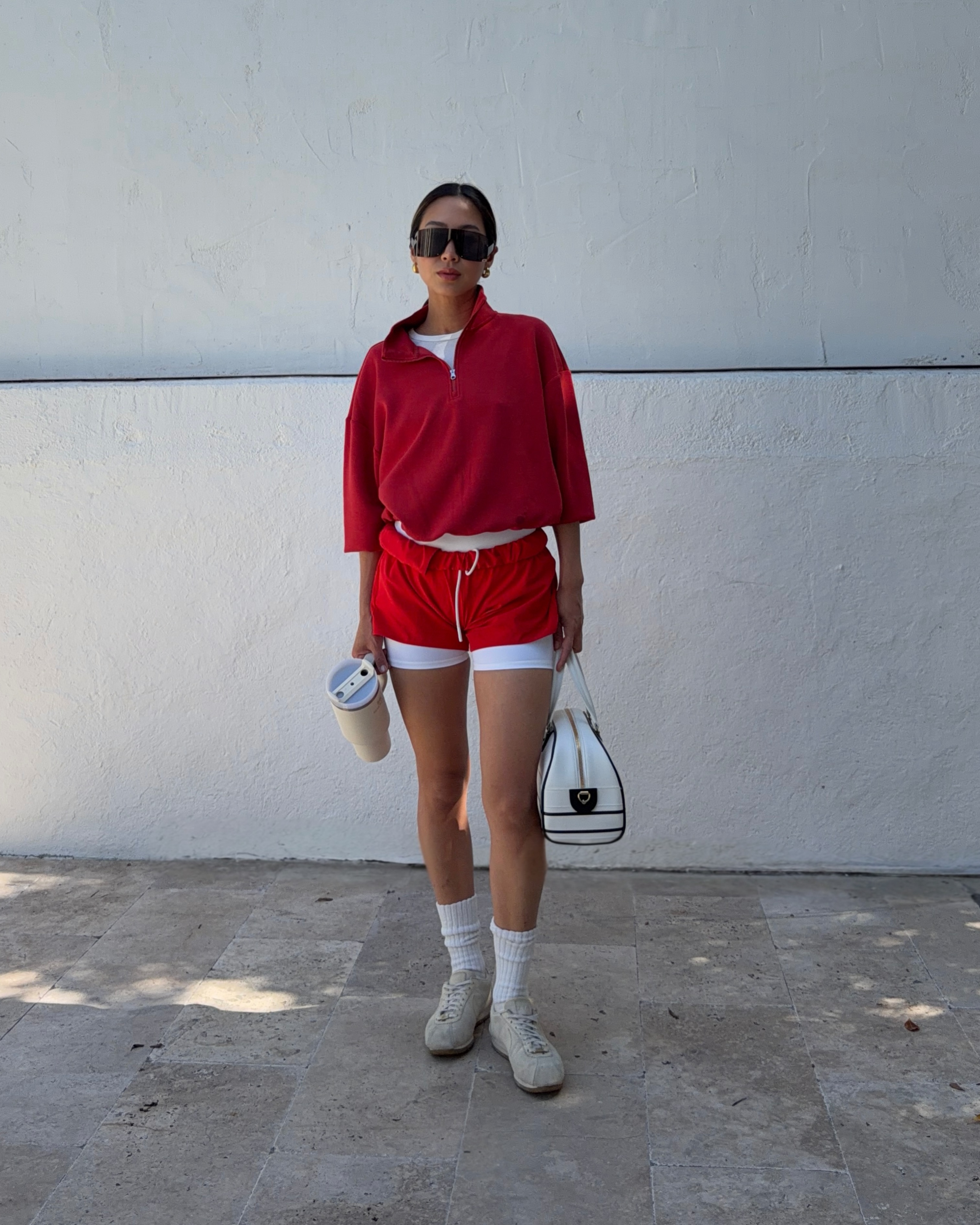 An image of a woman wearing best shoes with sporty shorts