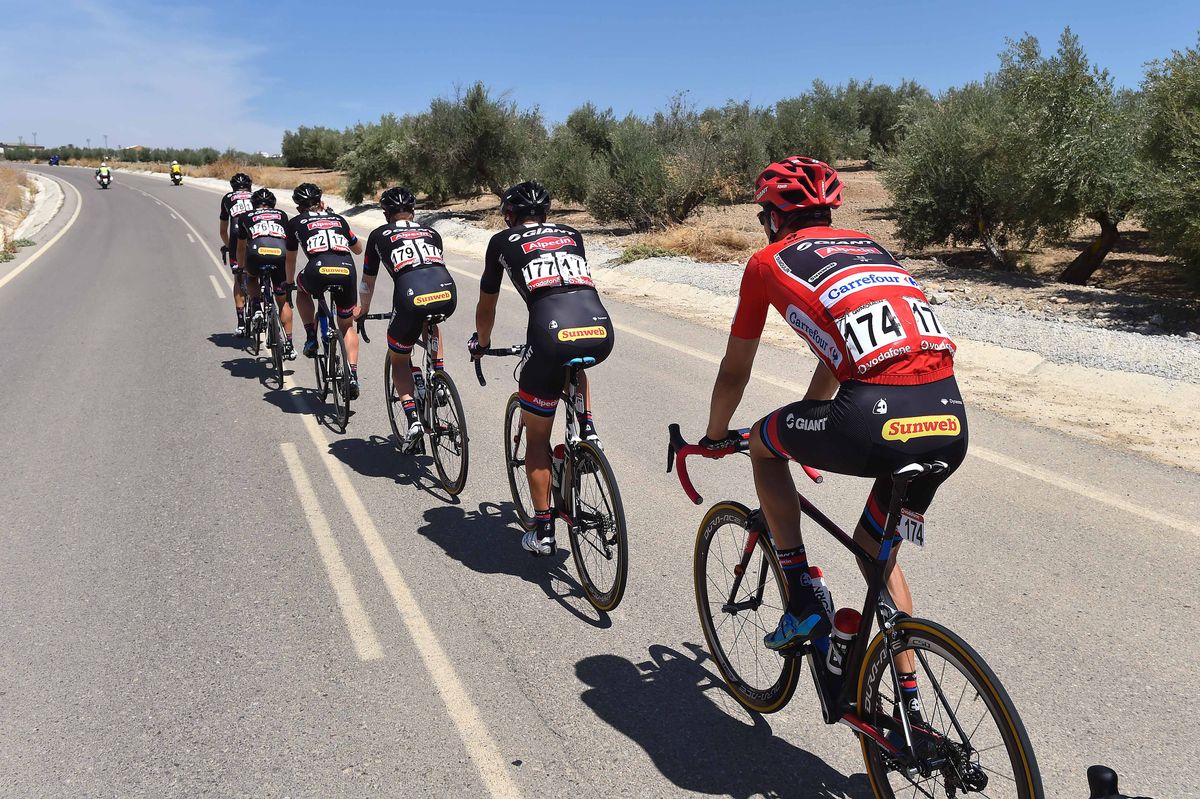 Tom Dumoulin sits safely behind his teammates