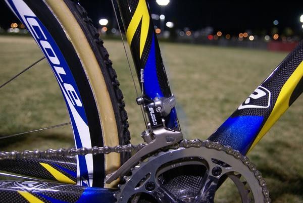 The Chorus front derailleur cable wraps around a pulley at the bottom bracket.