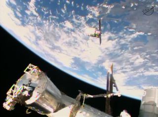 Orbital Sciences' Cygnus commercial cargo ship is on its final approach to the International Space Station before being captured by a robotic arm on Jan. 12, 2014.