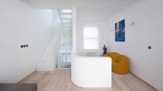 redesigned staircase and white interiors in london transformation by architensions