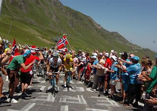 Rinaldo Nocentini is led to the top of the Tourmalet by his loyal teammates