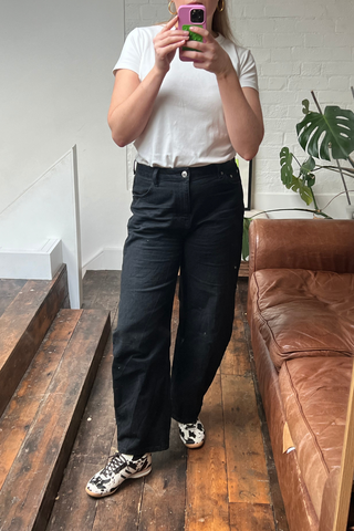 An image of Who What Wear UK e-Commerce Analyst, Sophie Cookson, wearing one of the best white t-shirts.