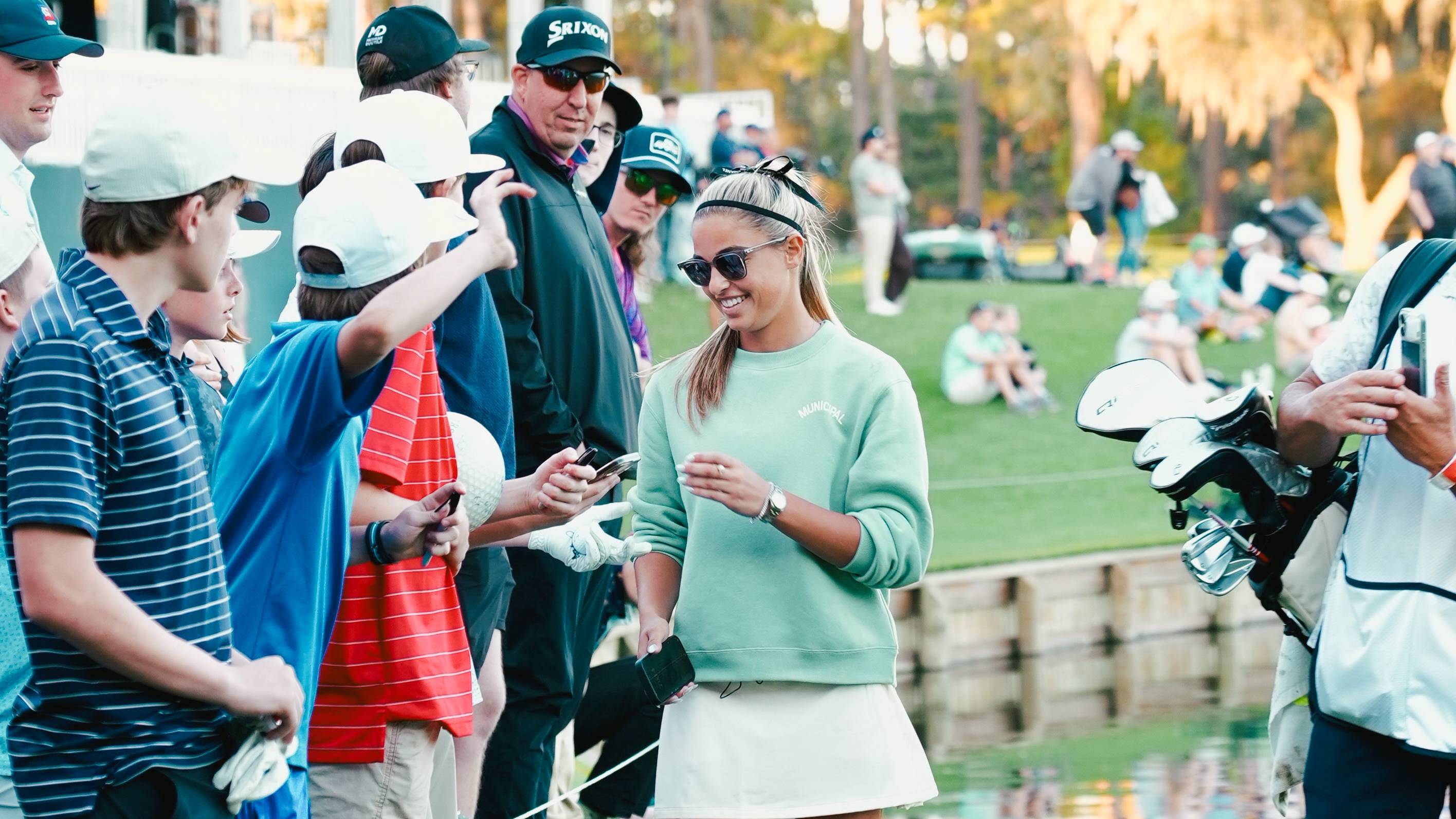Gabby Golf Girl signing autographs