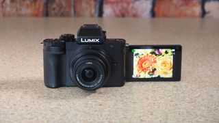 Panasonic Lumix G100D on a kitchen work surface