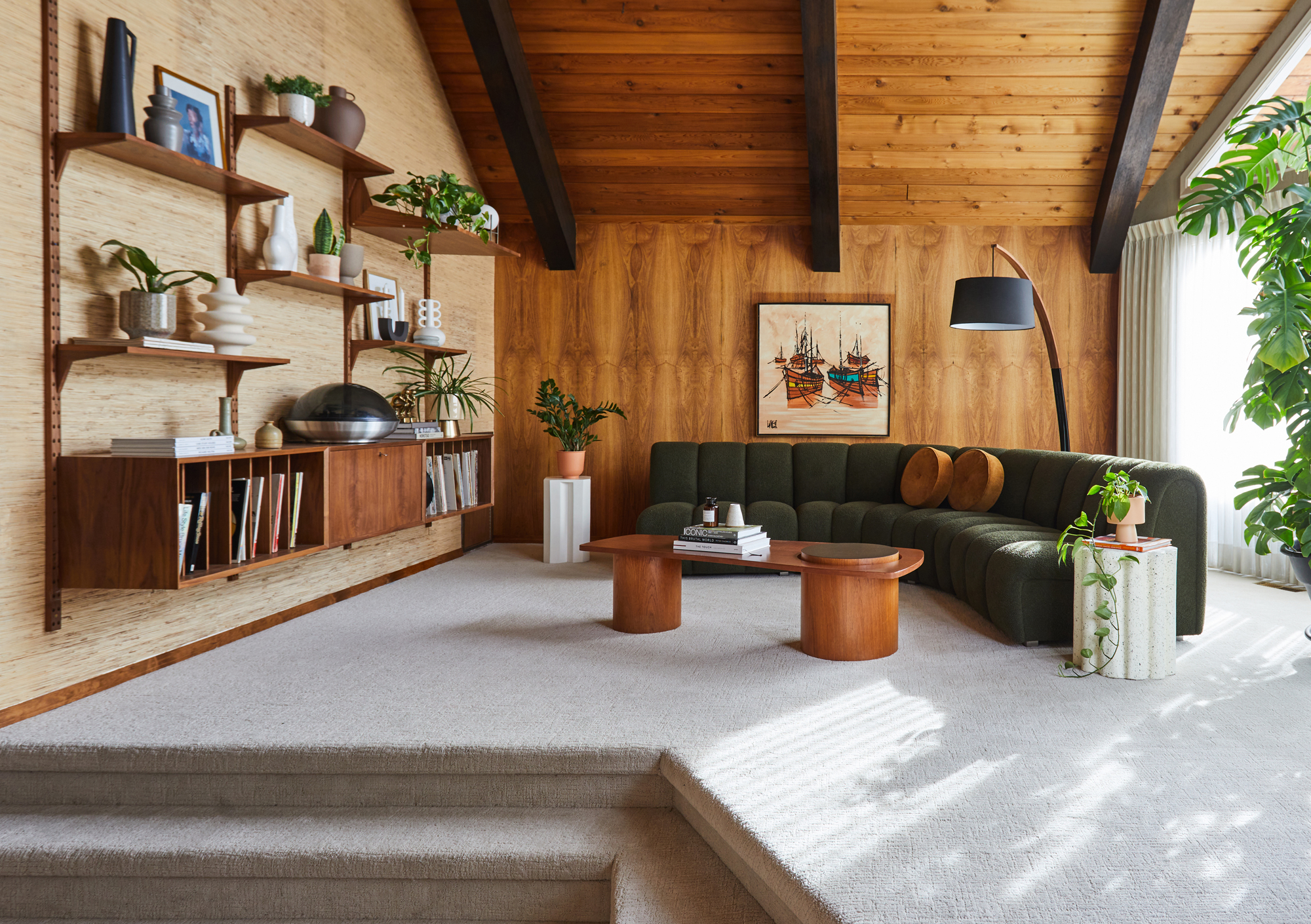 a living room with many wood elements