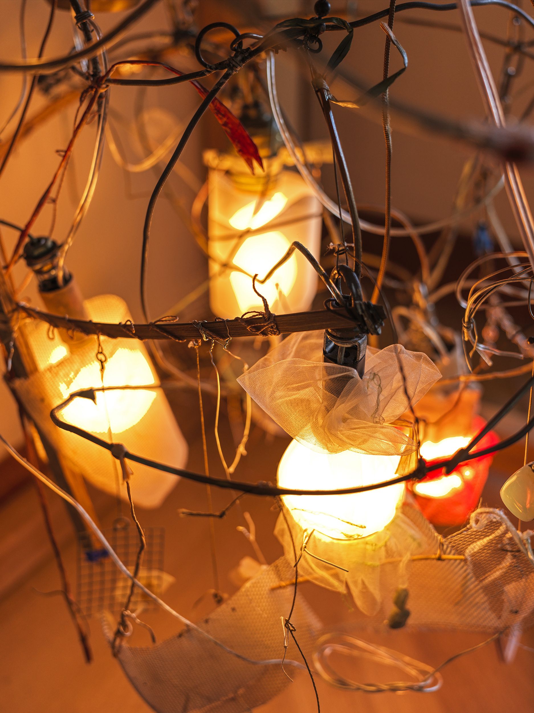 Bulbs wrapped in mesh and netting give off a warm glow