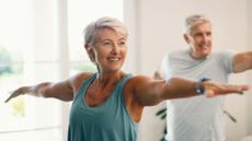 Senior couple exercise at home