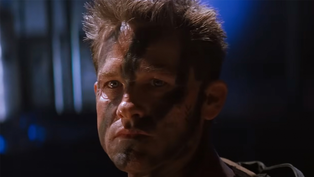 Kurt Russell with camo paint on his face in Soldier.