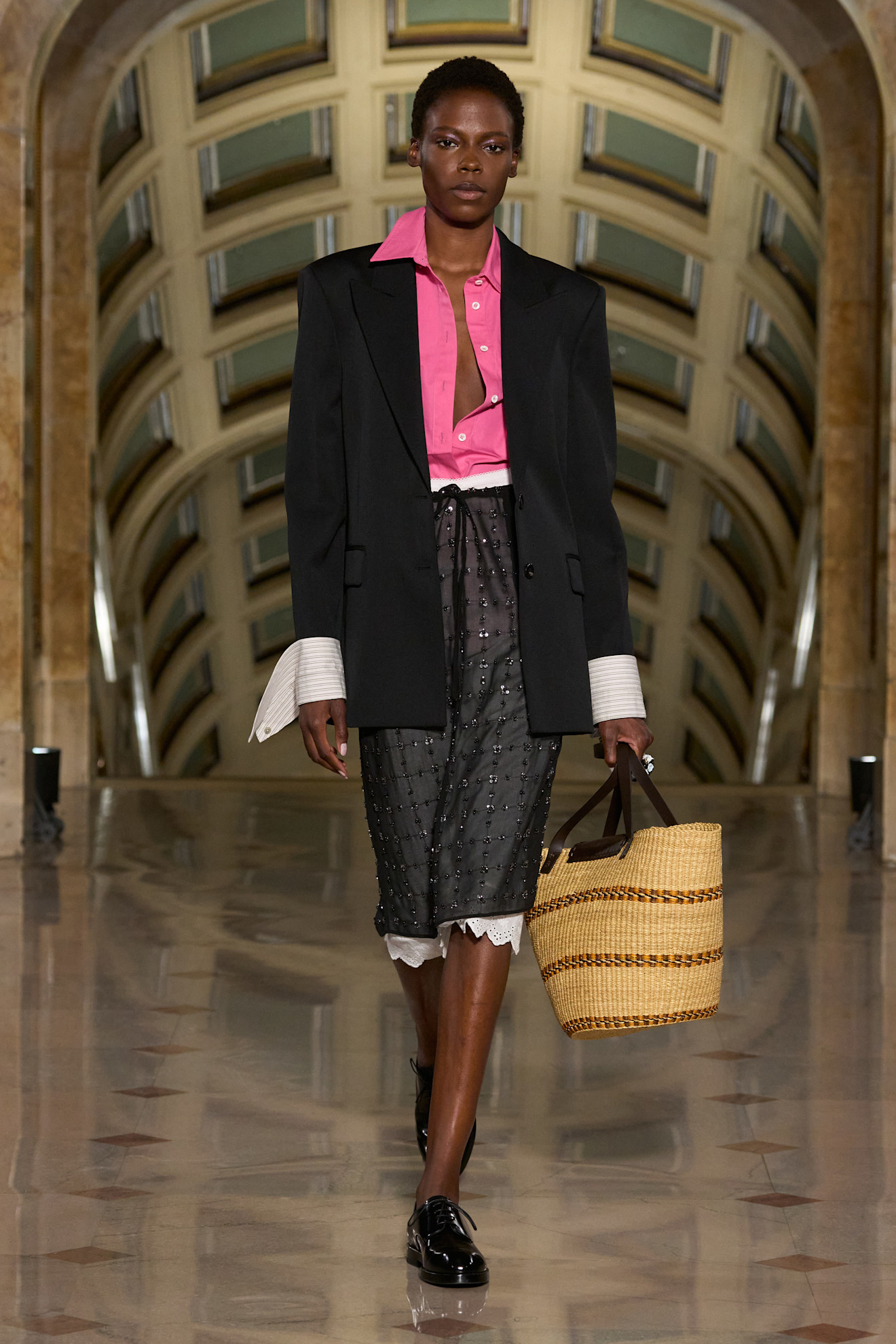 Altuzarra models wearing coats on the 2027 runway