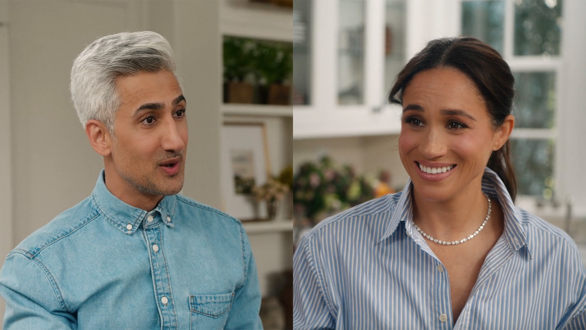 Tan France and Meghan Markle both wear button downs and stand in a kitchen in With Love, Meghan.