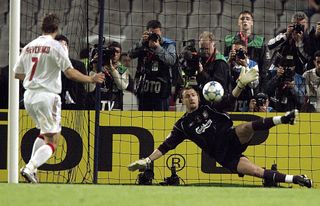 Liverpool goalkeeper Jerzy Dudek saves from Milan's Andriy Shevchenko to secure victory on penalties in the 2005 Champions League final