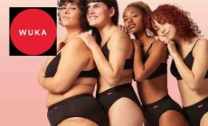 Wuka logo placed over an image of four women posing next to eachother