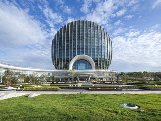 The imposing glazed disc of Sunrise Kempinski Hotel in Beijing by Shanghai Huadu Architecture & Urban Planning Co.
