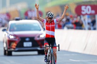 OYAMA JAPAN JULY 25 Anna Kiesenhofer of Team Austria celebrates winning the gold medal on day two of the Tokyo 2020 Olympic Games at Fuji International Speedway on July 25 2021 in Oyama Shizuoka Japan Photo by Tim de WaeleGetty Images