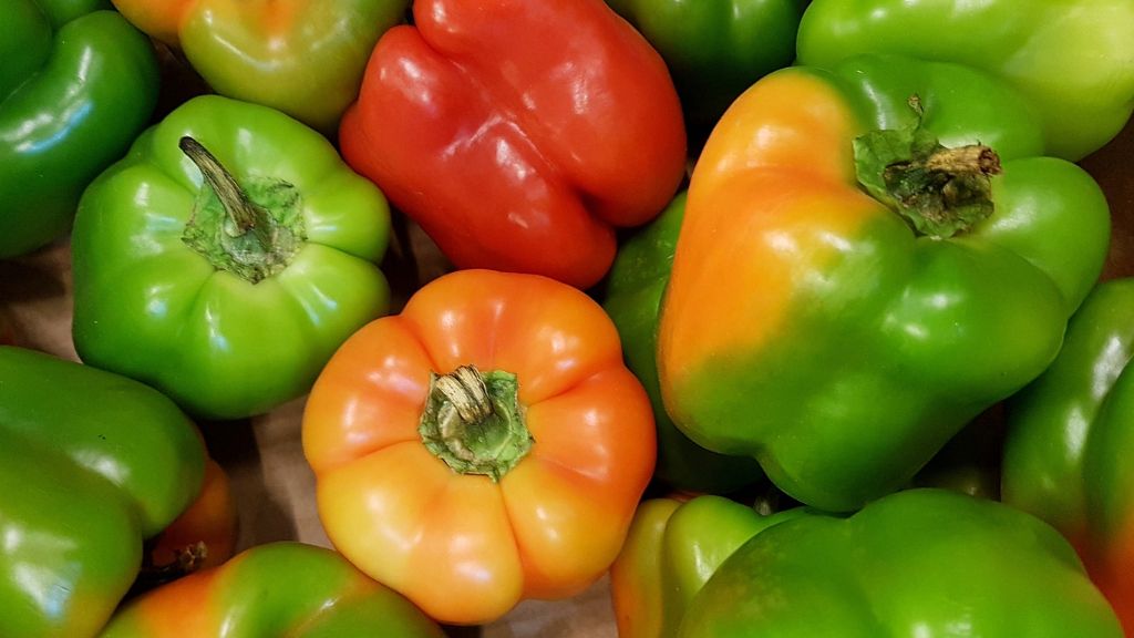 green red and orange peppers